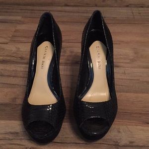 Black platform open toed pumps
